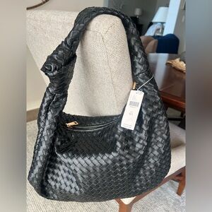 Anthropolgie :   Elegant Black Woven Women's  bag 
Never used   Tag on